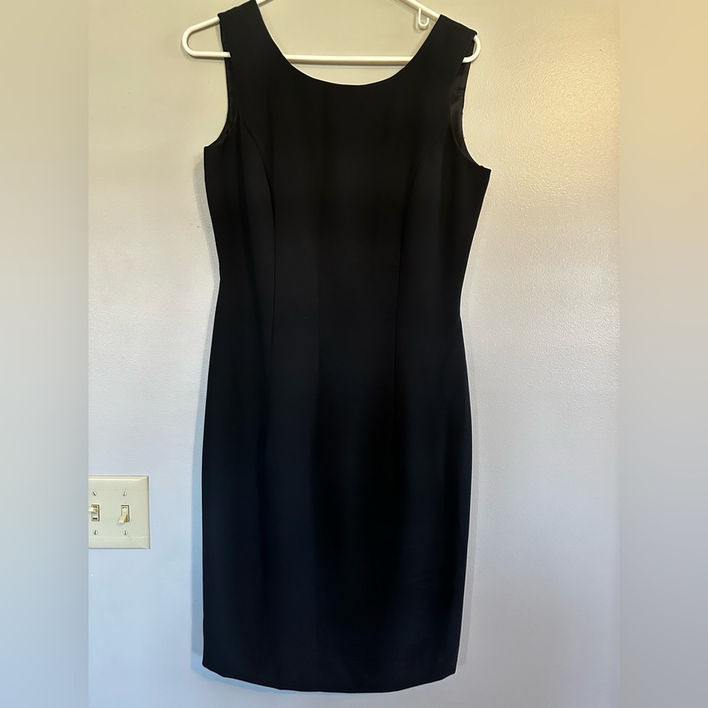 Perfect lil black dress, scooped back.